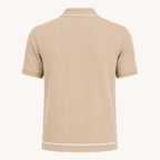 The Calder Ribbed Golf Polo — Sand Beige